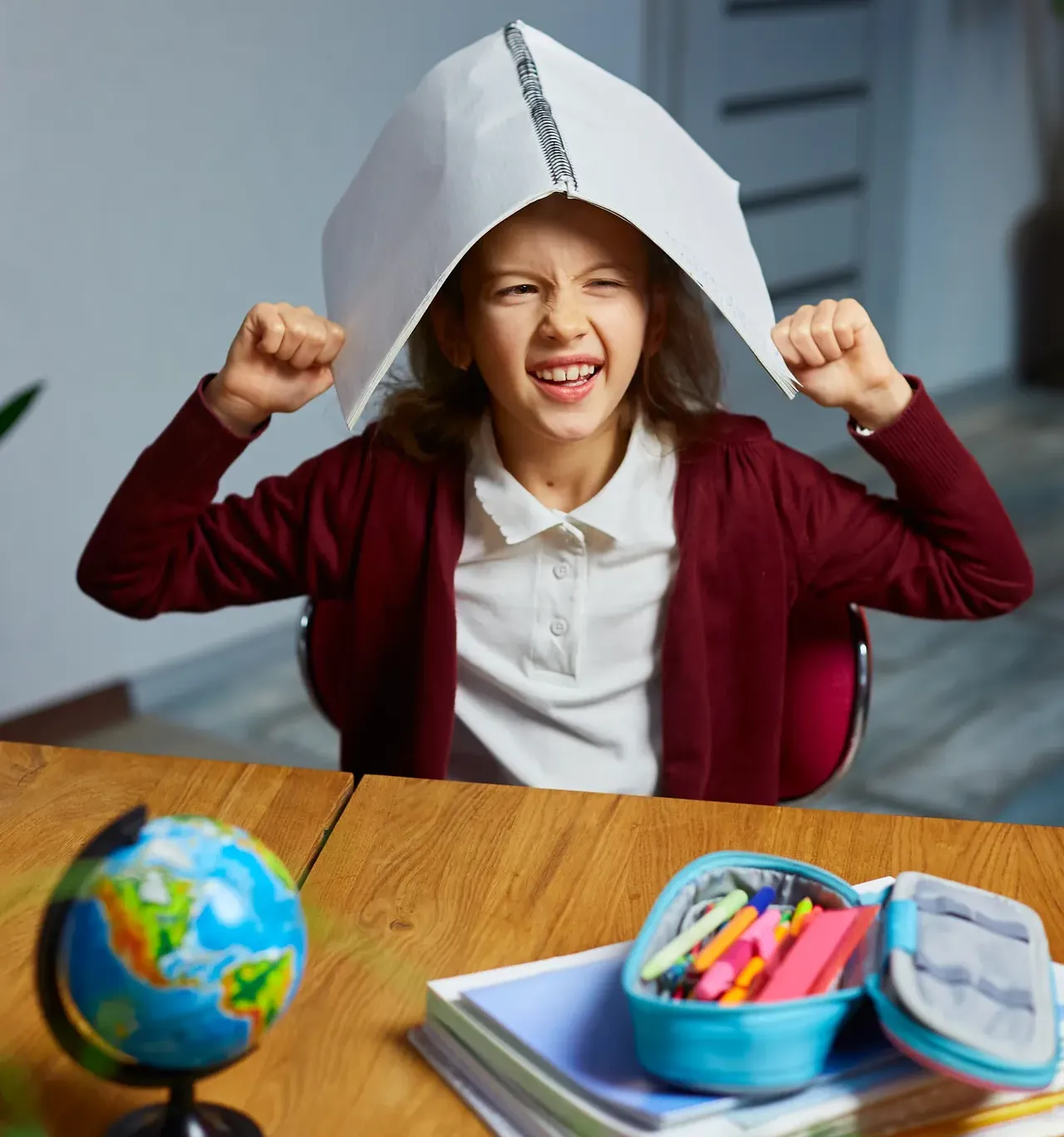 happy-schoolgirl-smart-girl-arms-put-workbook-on-2023-11-27-04-55-58-utc (1)–